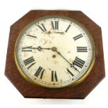 A VICTORIAN OAK FUSÈE STATION WALL CLOCK With circular brass bezel and Roman number markings, in
