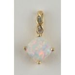 A 14CT GOLD, OPAL AND DIAMOND PENDANT The square cut opal with two round cut diamonds to bale. (opal