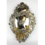 A 19TH CENTURY SILVER PLATE AND GILT BRASS WALL SCONCE With embossed shell and scroll decoration,