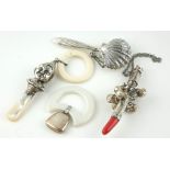 A COLLECTION OF FOUR 19TH CENTURY AND LATER CONTINENTAL SILVER CHILD'S RATTLES To include a rattle