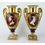A PAIR OF 19TH CENTURY PARIS PORCELAIN VASES Twin handled with classical busts of 'Drusus and