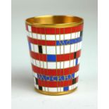 A RUSSIAN SILVER GILT AND ENAMEL SHOT CUP Having red and white geometric enamel decoration, marked