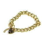 A VINTAGE 9CT GOLD BRACELET Uniform links with heart form clasp. (approx overall length 16cm)