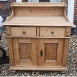 A 19TH CENTURY FRENCH PINE SIDE CABINET With galleried back above two drawers and cupboards. (90cm x