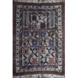A BELUCH PRAYER RUG Geometric form arch and motifs with running borders. (approx 88cm x 126cm)