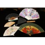 A COLLECTION OF LATE 19TH CENTURY FANS Comprising a Chinese carved bone fan with painted feathers, a