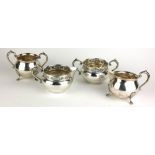 TWO PAIRS OF EARLY 20TH CENTURY CONTINENTAL SILVER SUGAR BOWLS AND CREAM JUGS A pair with embossed