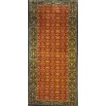 A GOOD QUALITY INDIAN CZAR WOOLLEN RUNNER With central stylised floral field contained within a