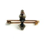 A LATE 19TH/EARLY 20TH CENTURY 9CT GOLD AND SILVER ENAMELLED BLACKAMOOR BROOCH The turban set with