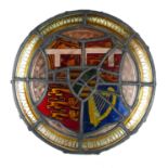 A VICTORIAN STAINED GLASS ROUNDEL Hand finished with three lions and harp to shield, with 'Duke of