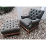 A VICTORIAN STYLE ARMCHAIR AND FOOTSTOOL Green button back fabric upholstery. (83cm x 80cm x 87cm)