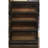 GLOBE-WERNICKE, AN EARLY 20TH CENTURY EBONISED OAK FIVE SECTION BOOKCASE. (47cm x 23cm x 87cm)