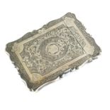 A VICTORIAN SILVER CALLING CARD CASE Having fine chased decoration, hallmarked Birmingham, 1865. (