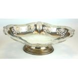 A VINTAGE SILVER OVAL CAKE BASKET Pierced decoration, on a pedestal base, hallmarked Sheffield,