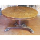 A VICTORIAN MAHOGANY CIRCULAR BREAKFAST TABLE The floral carved surface raised on a substantial