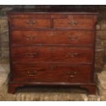 A GEORGIAN MAHOGANY CHEST OF TWO SHORT ABOVE THREE LONG DRAWERS With original brass swan neck