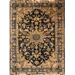 AN IRANIAN QUM DESIGN RUG The central floral sprays contained within running borders on a blue