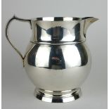 A CONTINENTAL PLAIN STERLING SILVER BALUSTER WATER JUG Marked to base '4½ pint'. (approx 17cm)