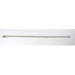 AN 18CT WHITE GOLD AND DIAMOND TENNIS BRACELET Having a single row of round cut diamonds. (approx