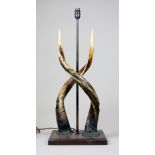 A LATE 20TH CENTURY TAXIDERMY NYALA HORN LAMP (h 70cm x w 30cm x d 21cm)