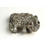 A 20TH CENTURY RUSSIAN SILVER AND GARNET MODEL OF A TOAD With garnet set eyes, bearing 'Kokovshnik