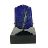 A CHINESE CARVED LAPIS LAZULI BUDDHA Seated pose on black perspex base. (approx 5.5cm)