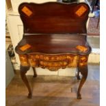 A LATE 18TH CENTURY DUTCH WALNUT FLORAL MARQUETRY GAMES CARD TABLE The fold over top having one