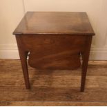 A GEORGIAN MAHOGANY LOW SIDE TABLE The rise and fall top above a shaped apron, raised on square