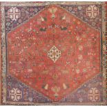 A CAUCASIAN ZOOAMORPHIC RED AND BLUE WOOLLEN RUG. (approx 198cm x 187cm)