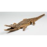 AN EARLY 20TH CENTURY TAXIDERMY CROCODILE. (130cm)