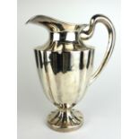 A LARGE STERLING SILVER WATER JUG Fluted design to body, marked 'Marciel Sterling Mexico'. (approx