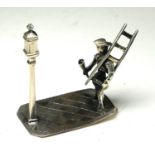 A DUTCH SILVER NOVELTY 'GAS LAMP LIGHTER' FIGURE Gent wearing period clothing with ladder and