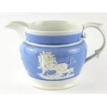 AN EARLY 19TH CENTURY STONEWARE POTTERY JUG Having applied Royal Coat of Arms and lion figures on