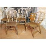 A SET OF FOUR 19TH CENTURY ASH AND ELM WINDSOR CHAIRS Including one carver.