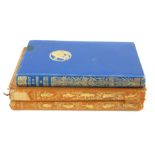 A.A. MILNE, TWO EARLY 20TH CENTURY LEATHER BOUND CHILDREN'S BOOKS Comprising two monogram edition