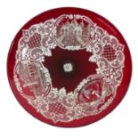 A LARGE 20TH CENTURY VENETIAN RUBY GLASS CHARGER DISH Hand painted with three landscape cartouches
