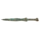 A CHINESE ARCHAIC DESIGN BRONZE DAGGER Having a heart form finial to handle. (approx 37cm)