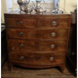 A VICTORIAN MAHOGANY BOW FRONTED CHEST Of two short above three long drawers, on bracket feet. (