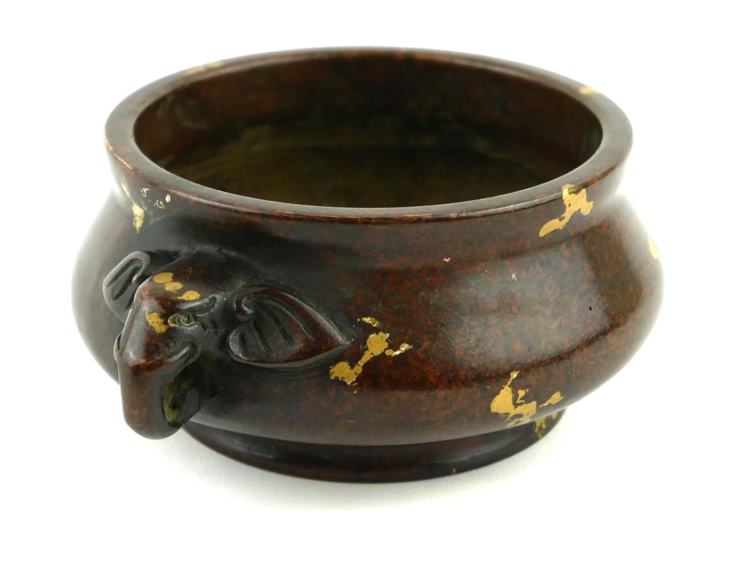 A CHINESE BRONZE CENSER WITH DOUBLE ELEPHANT MASK HANDLES Gilt splash decoration and square - Image 3 of 5