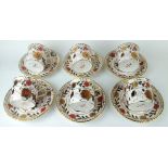 ROYAL CROWN DERBY, ASIAN ROSE, A VINTAGE PORCELAIN TEA SET Comprising six cups and saucers,