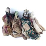 A COLLECTION OF FOUR 19TH CENTURY CHINESE CARVED WOODEN THEATRICAL DOLLS Each wearing Chinese silk