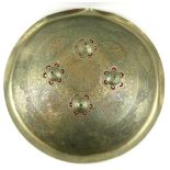 AN INDIAN WHITE METAL SPHERICAL SHIELD Mughal style inscriptions, four raised dome mounts and red