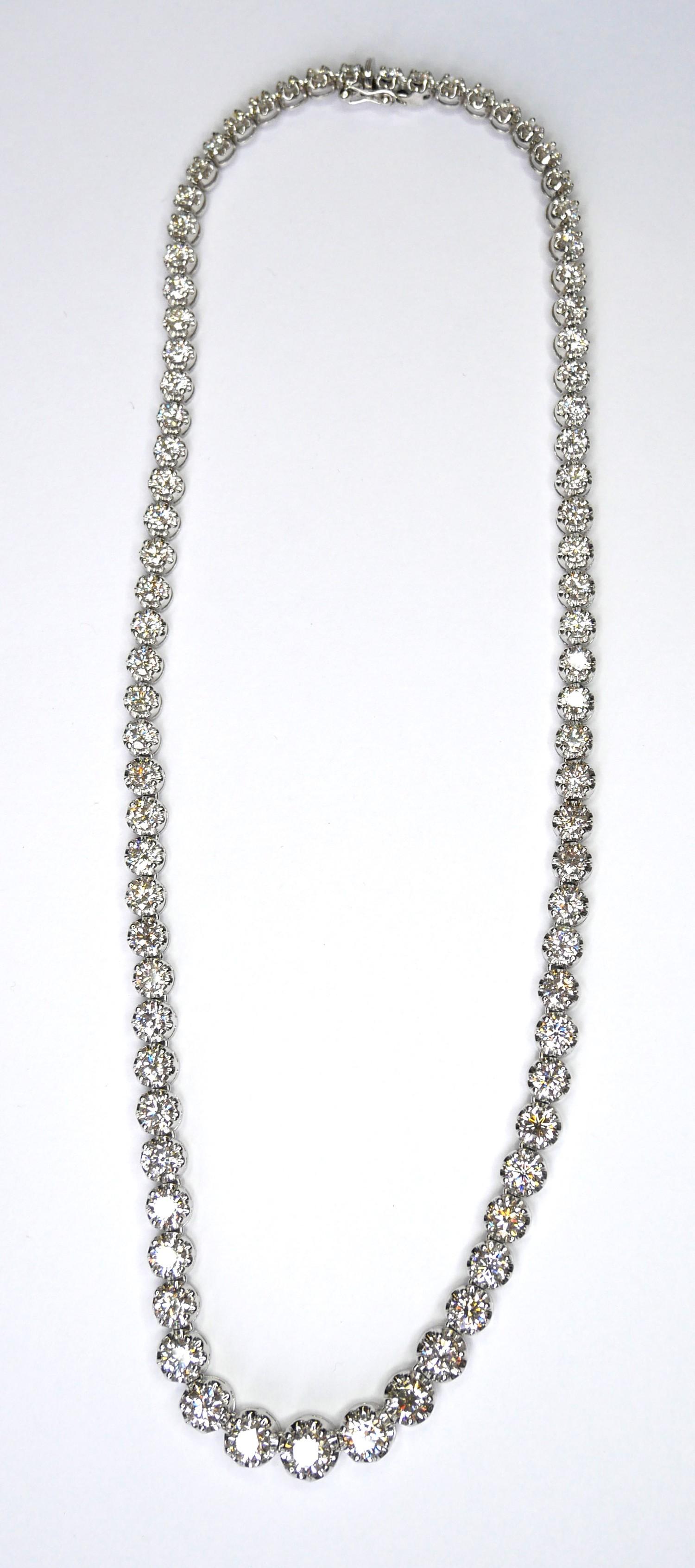 AN 18CT WHITE GOLD AND DIAMOND NECKLACE Having a single row of graduating round cut diamonds. (