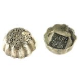 TWO CHINESE WHITE METAL CIRCULAR WEIGHTS With scalloped edges, bearing impressed Chinese character