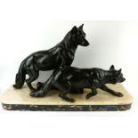 AN ART DECO SPELTER AND MARBLE WOLF SCULPTURE Two wolves in hunting pose, on a rectangular