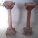 A PAIR OF INDIAN CARVED STONE JARDINIÈRE Having carved floral bowl, receded columns and matching