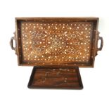 AN EARLY 20TH CENTURY INDIAN HARDWOOD AND INLAID IVORY BUTLER'S TRAY Having twin handles and