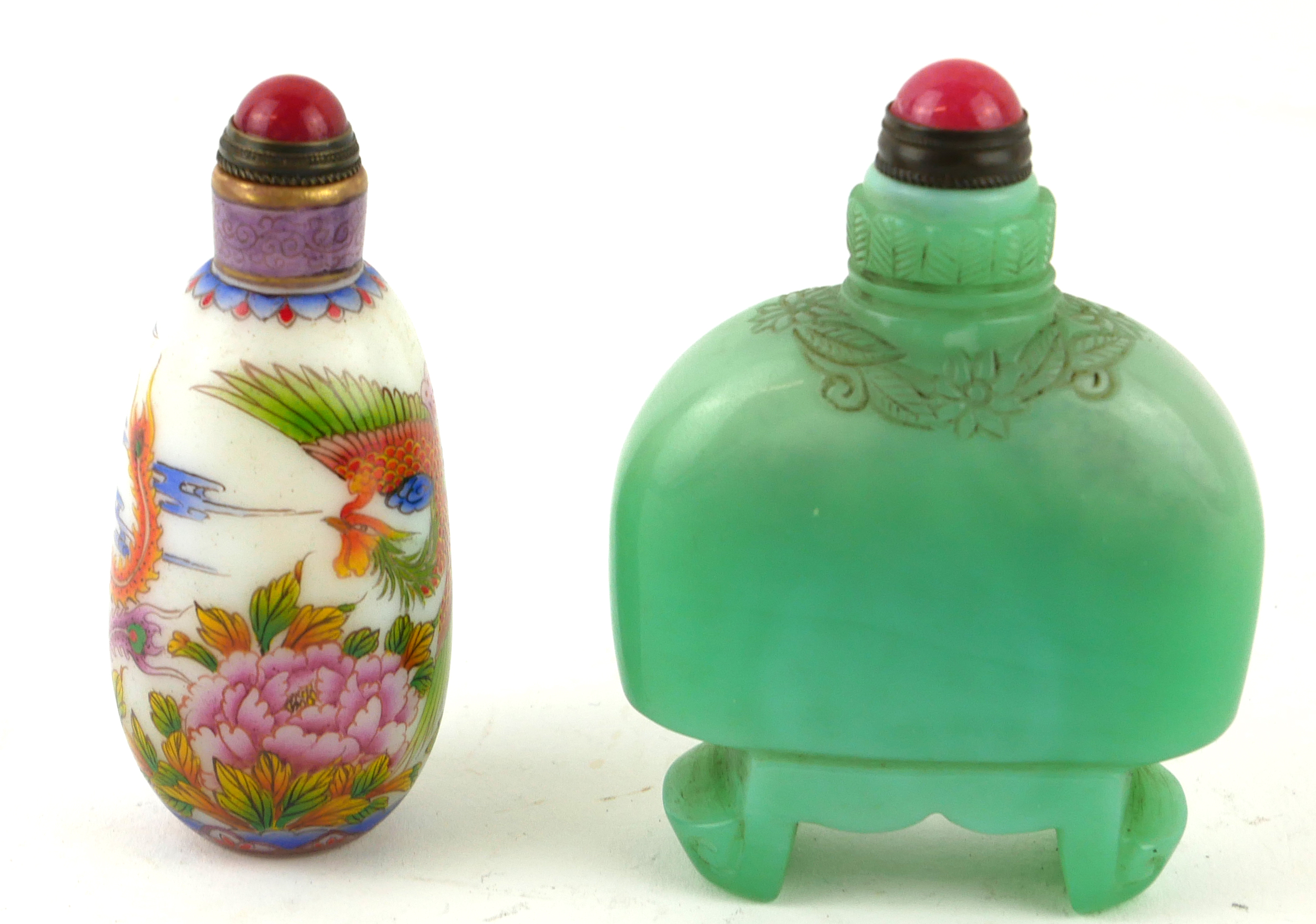 A CHINESE CARVED JADEITE AND HARDSTONE DOMED SNUFF BOTTLE With scrolled feet, together with a