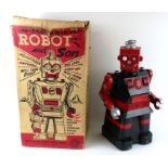 LOUIS MARX AND CO., A VINTAGE AMERICAN ELECTRIC ROBOT AND SON SPACE TOY Red and black plastic body