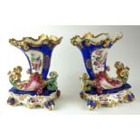 JACOB PETIT, A PAIR OF 19TH CENTURY FRENCH PORCELAIN CORNUCOPIA VASES Scrolled Rococo form with